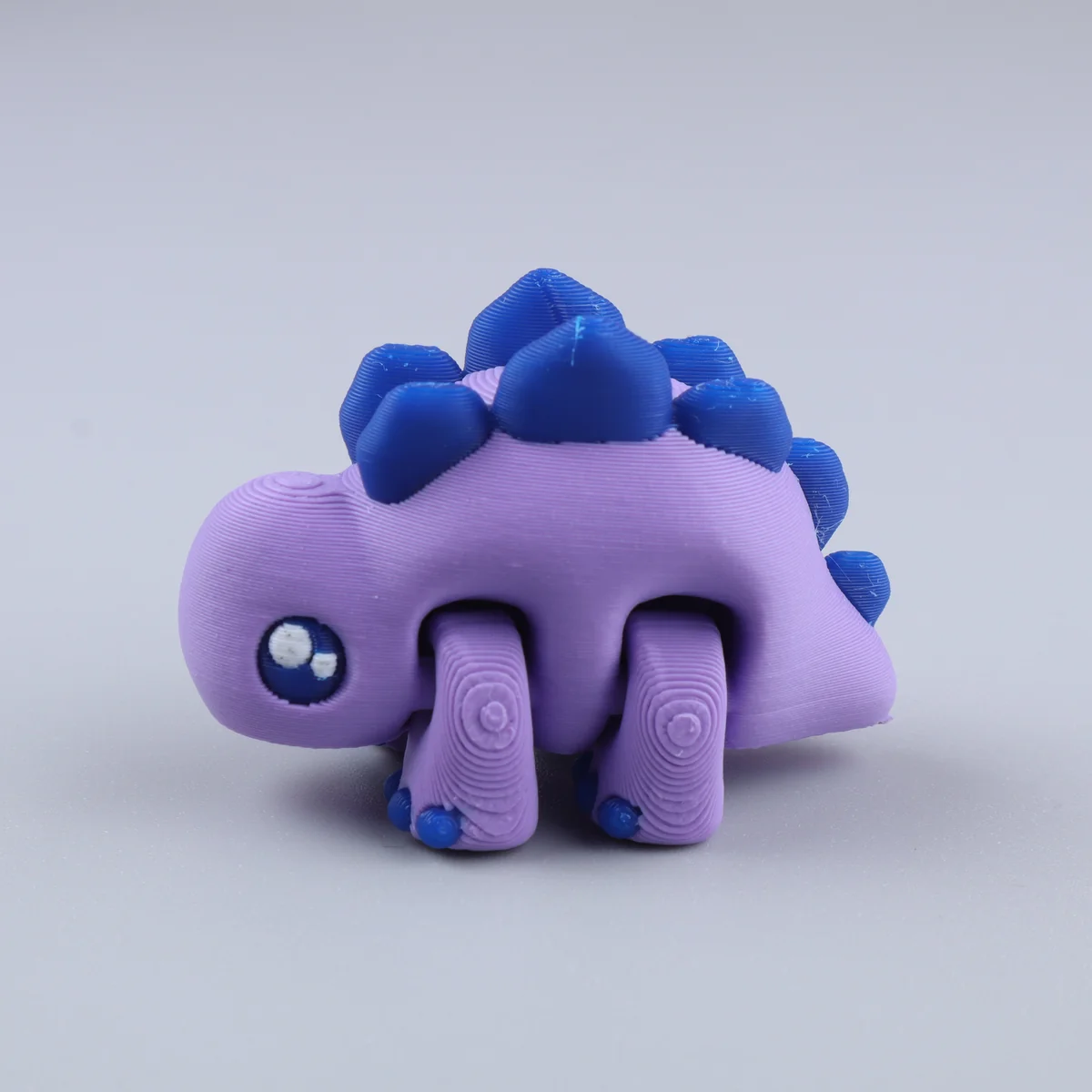 Foto da miniatura Estegossauro Roxo
