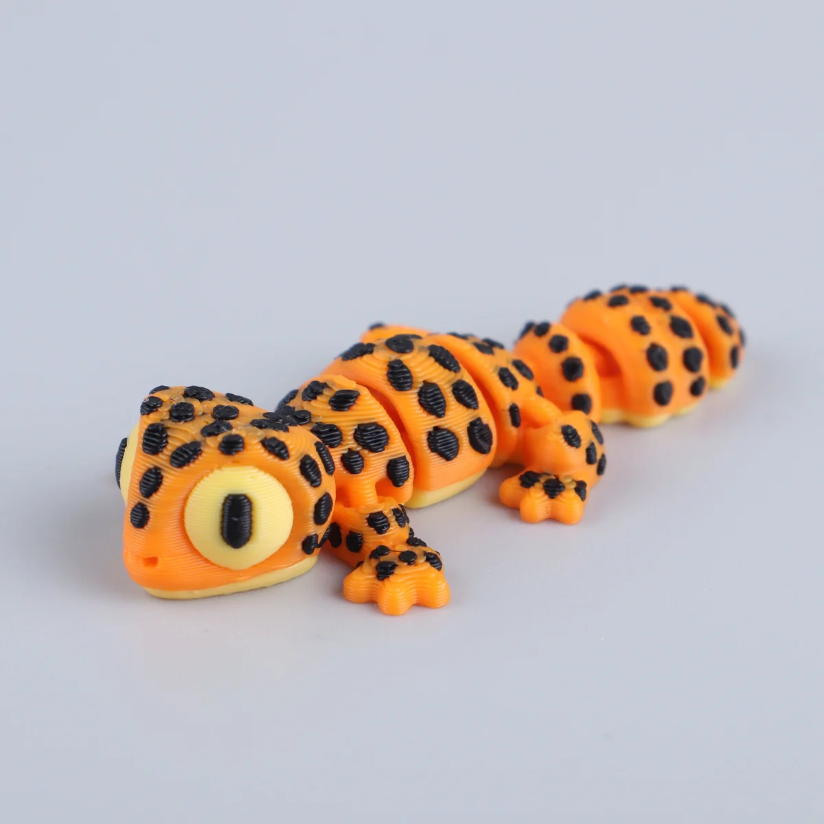 Foto da miniatura Geco Laranja